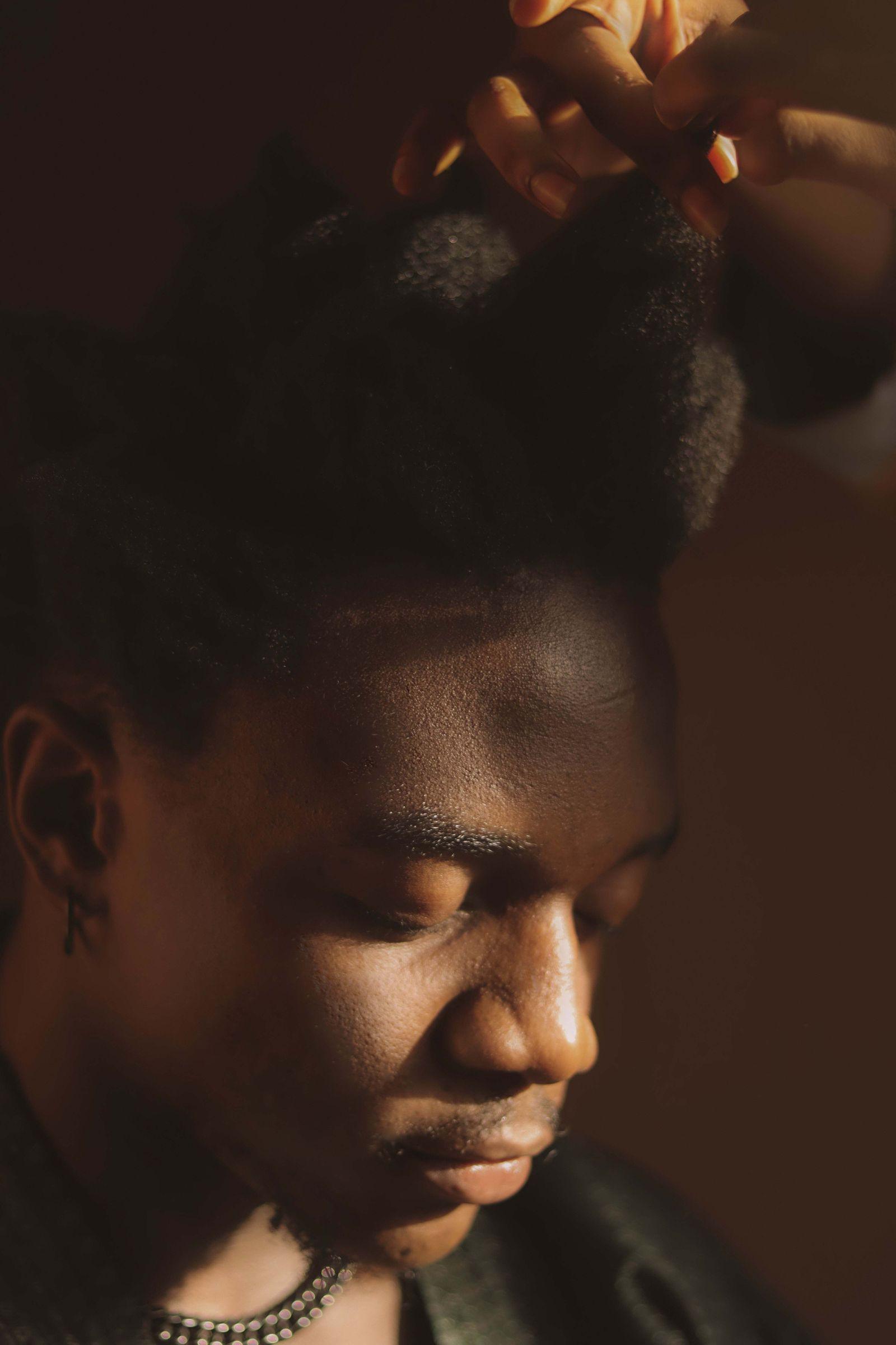 Structured hi-top fade; concept placeholder photography