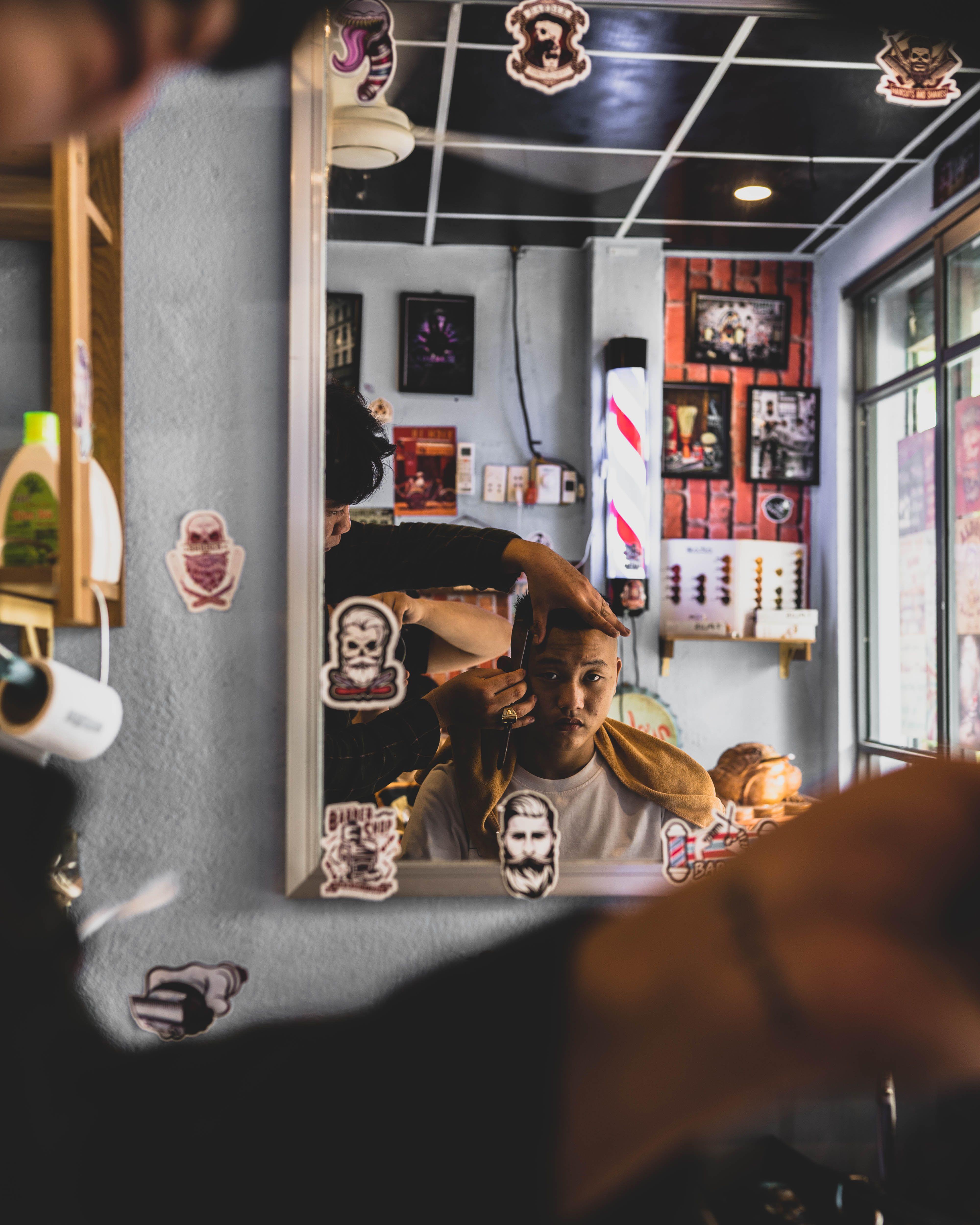 Textured scissor haircut viewed in a mirror; concept placeholder photography