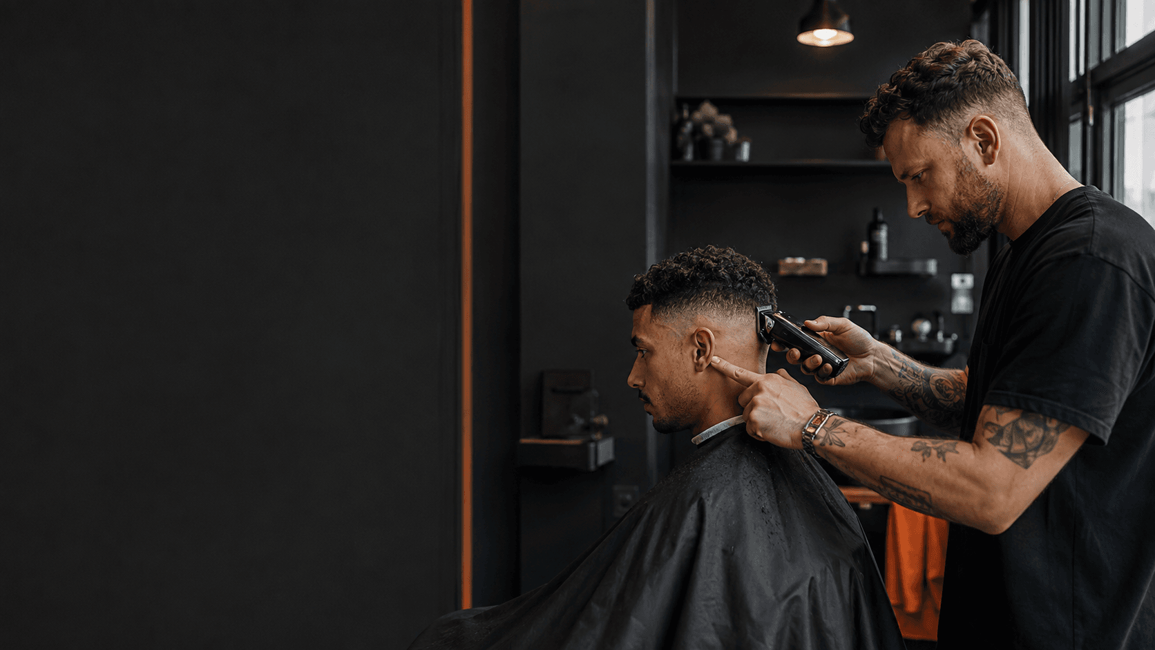 Barber finishing a precision fade; concept placeholder photography